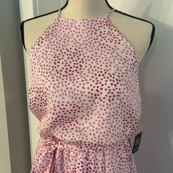 Dotted high neck, asymmetrical fit and flare dress​ - Picture 2 of 6